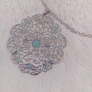 Silver color metal necklace with turquoise accent